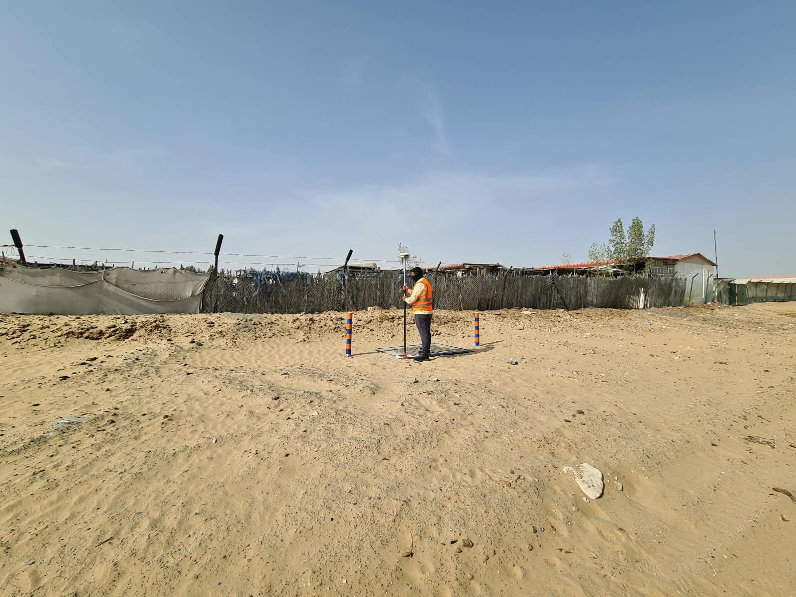Fortress Surveying team marking a land parcel boundary in Dubai